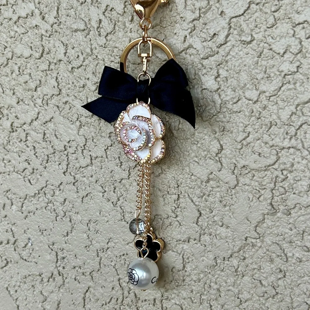 Luxe White Floral Keychain/Bag Charm with Black Bow
